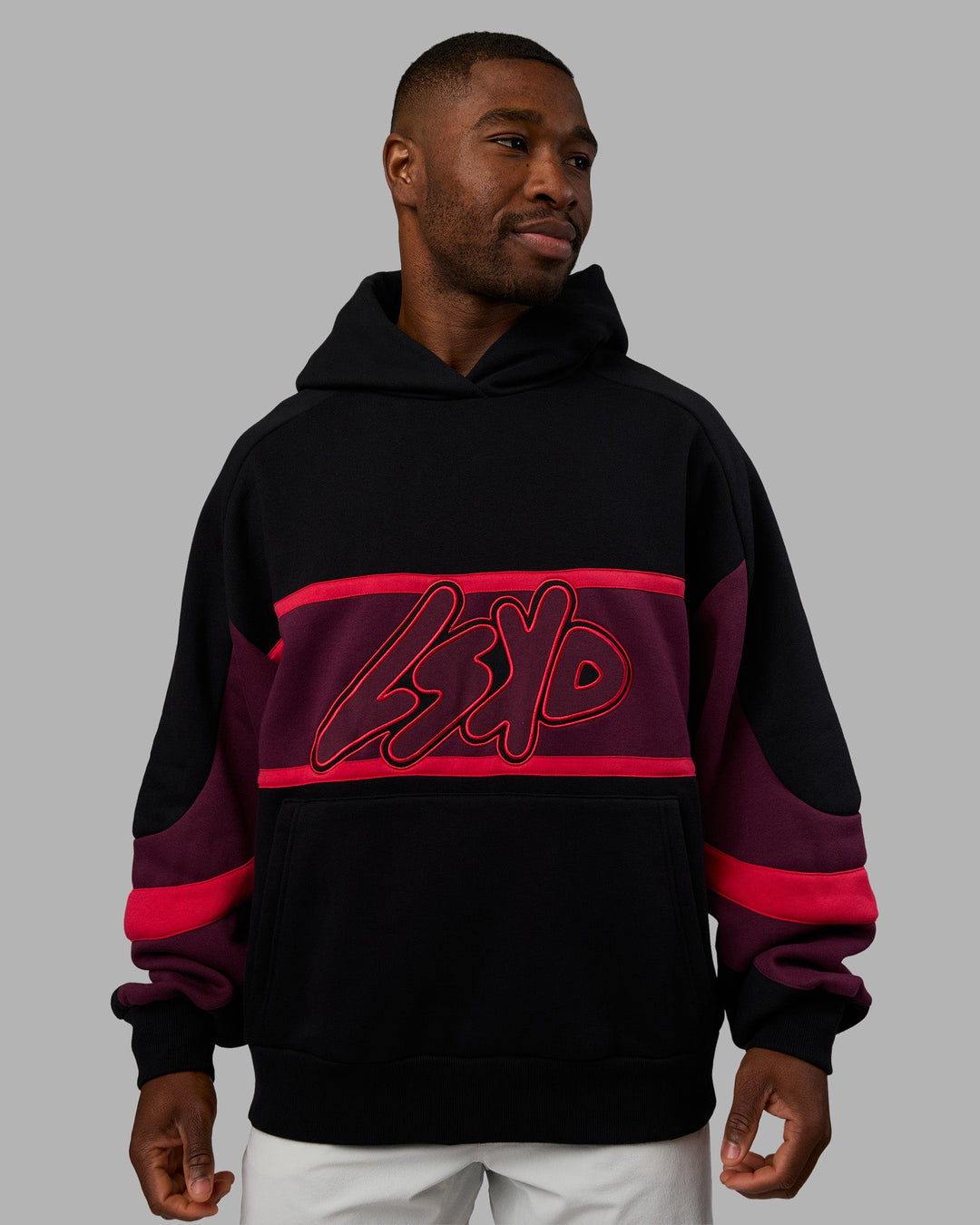 Man wearing Vibe Oversized Unisex Hoodie - Black-Cherry Lacquer | Model:Sam | Size:L - view 3