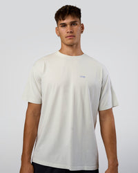 Man wearing We Love This  FLXCotton Oversized Tee - Digital Mist Washed-Electric Indigo | Model:Jackson | Size:L