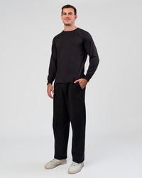 Man wearing Restore CloudFLX Sweater Black | Model:Alex | Size:M