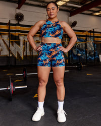 Woman wearing AMRAP High Neck Sports Bra - React Print | Model:Vana | Size:M