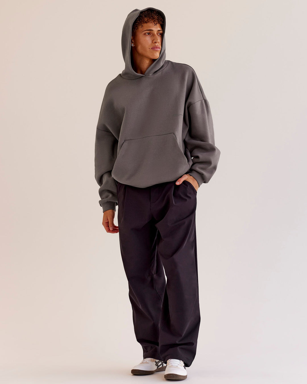 Man wearing AfterDark ZeroCrease Oversized Hoodie - Duskstone | Model:Leandro | Size:M