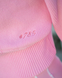 Woman wearing Fierce Knitted Cardigan - Pink Rose-White | Model:Shayna | Size:M