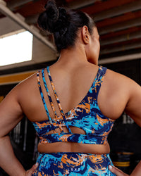 Woman wearing Galvanise Sports Bra 2.0 - React Print | Model:Vana | Size:M