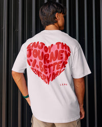 Man wearing Love the Journey FLXCotton Oversized Tee - White-Candy Pink | Model:George | Size:M