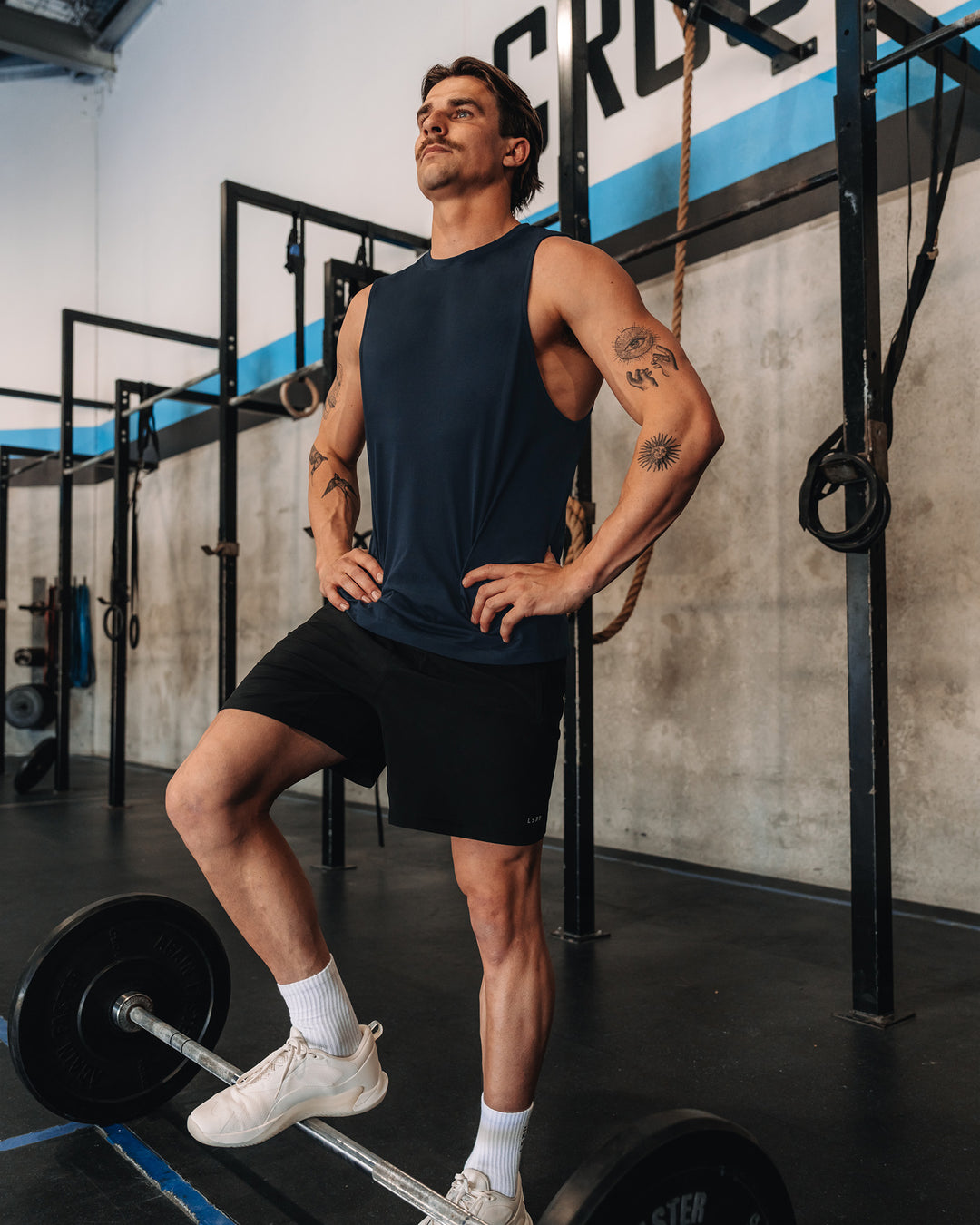 Man wearing AeroFLX+ Seamless Muscle Tank - Navy/Navy | Model: | Size:M