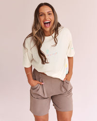 Woman wearing Mother's Day FLXCotton Oversize Tee - Off White | Model:Emma | Size:M
