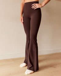 Woman wearing Peaches Elixir High-Rise Flared Pant - Hot Chocolate | Model:Dani | Size:M
