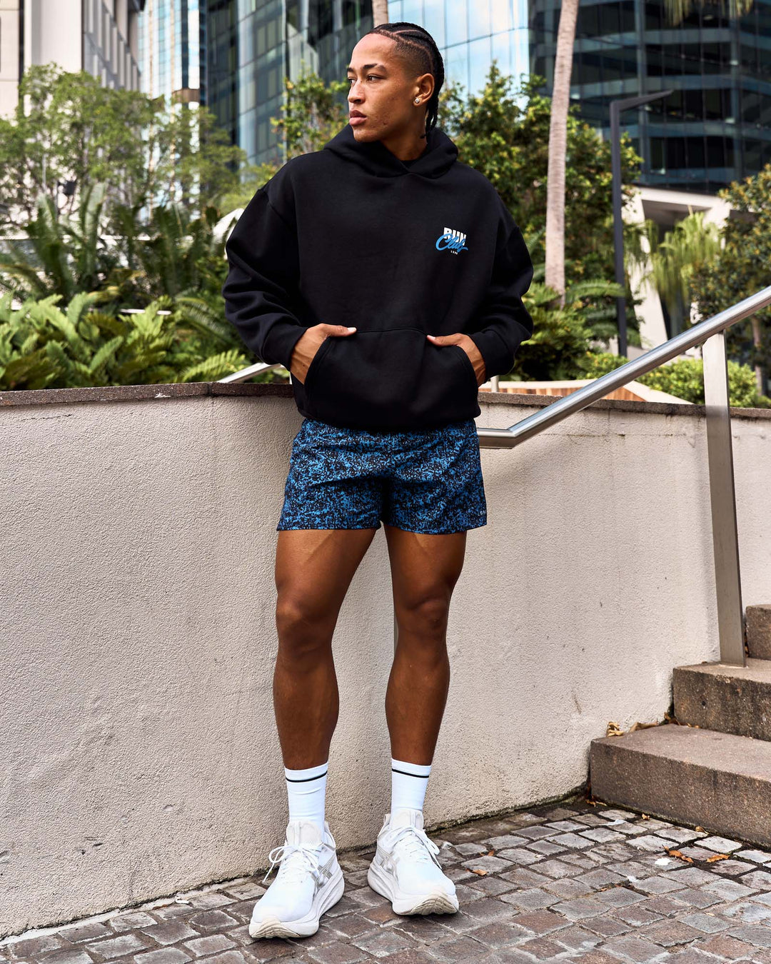 Man wearing Run Club Script Oversized Hoodie - Black-Palace Blue | Model:Malebo | Size:M