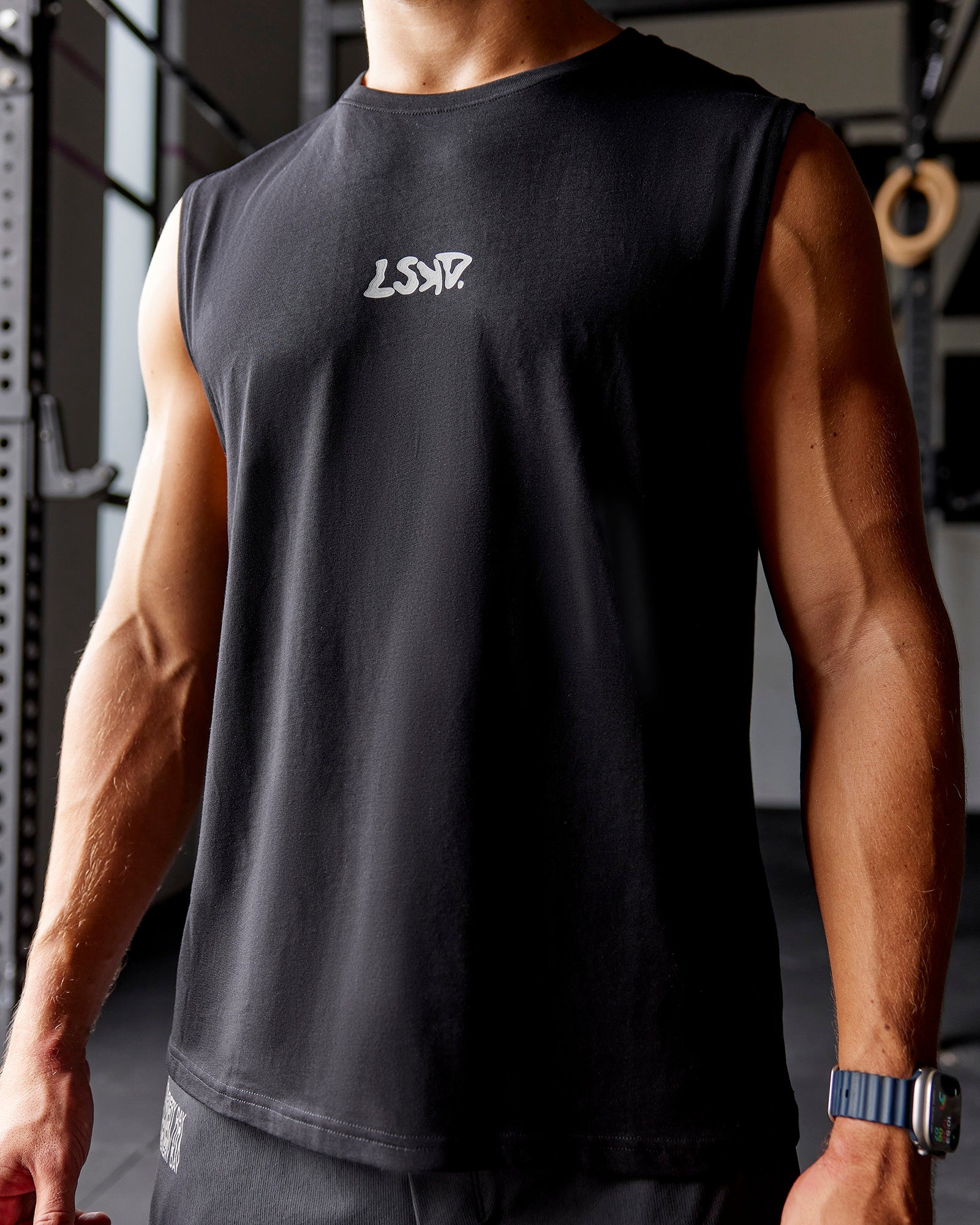 Man wearing Static Grit FLXCotton Tank - Black | Model:Jaiden | Size:M
