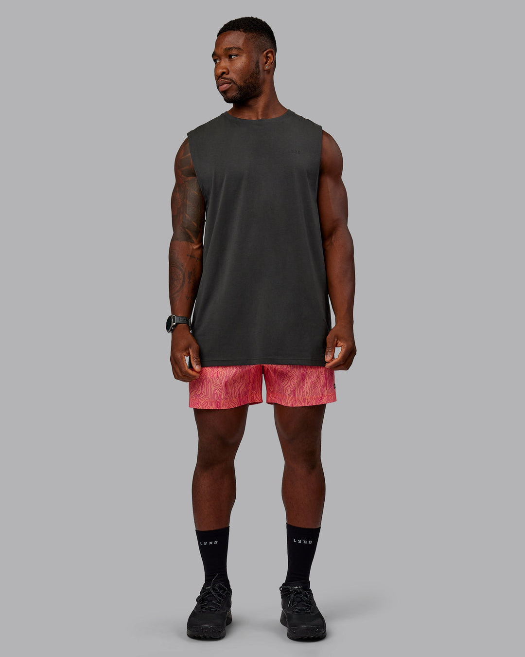Man wearing 1% Better Value Series FLXCotton Tank - Pirate Black-Black