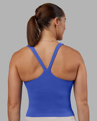 Woman wearing Abs Agile Tank - Power Cobalt | Model:Abbey | Size:M