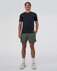 Man wearing AeroFLX+ Seamless Set In Tee - Black Marl | Model:Konnor | Size:M