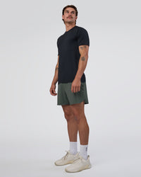 Man wearing AeroFLX+ Seamless Set In Tee - Black Marl | Model:Konnor | Size:M