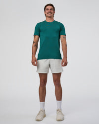 Man wearing AeroFLX+ Seamless Set In Tee - Teal/Teal | Model:Konnor | Size:M | Thumbnail Index: 2