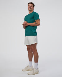 Man wearing AeroFLX+ Seamless Set In Tee - Teal/Teal | Model:Konnor | Size:M | Thumbnail Index: 1