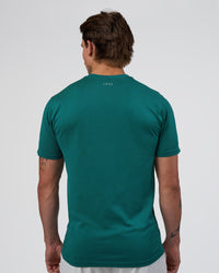 Man wearing AeroFLX+ Seamless Set In Tee - Teal/Teal | Model:Konnor | Size:M | Thumbnail Index: 3