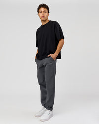 Man wearing AfterDark ZeroCrease Boxy Tee in Black | Model:Leandro | Size:M
