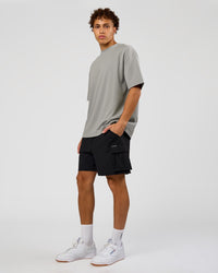 Man wearing AfterDark ZeroCrease Oversized Tee - Alloy | Model:Leandro | Size:M | Thumbnail Index: 7