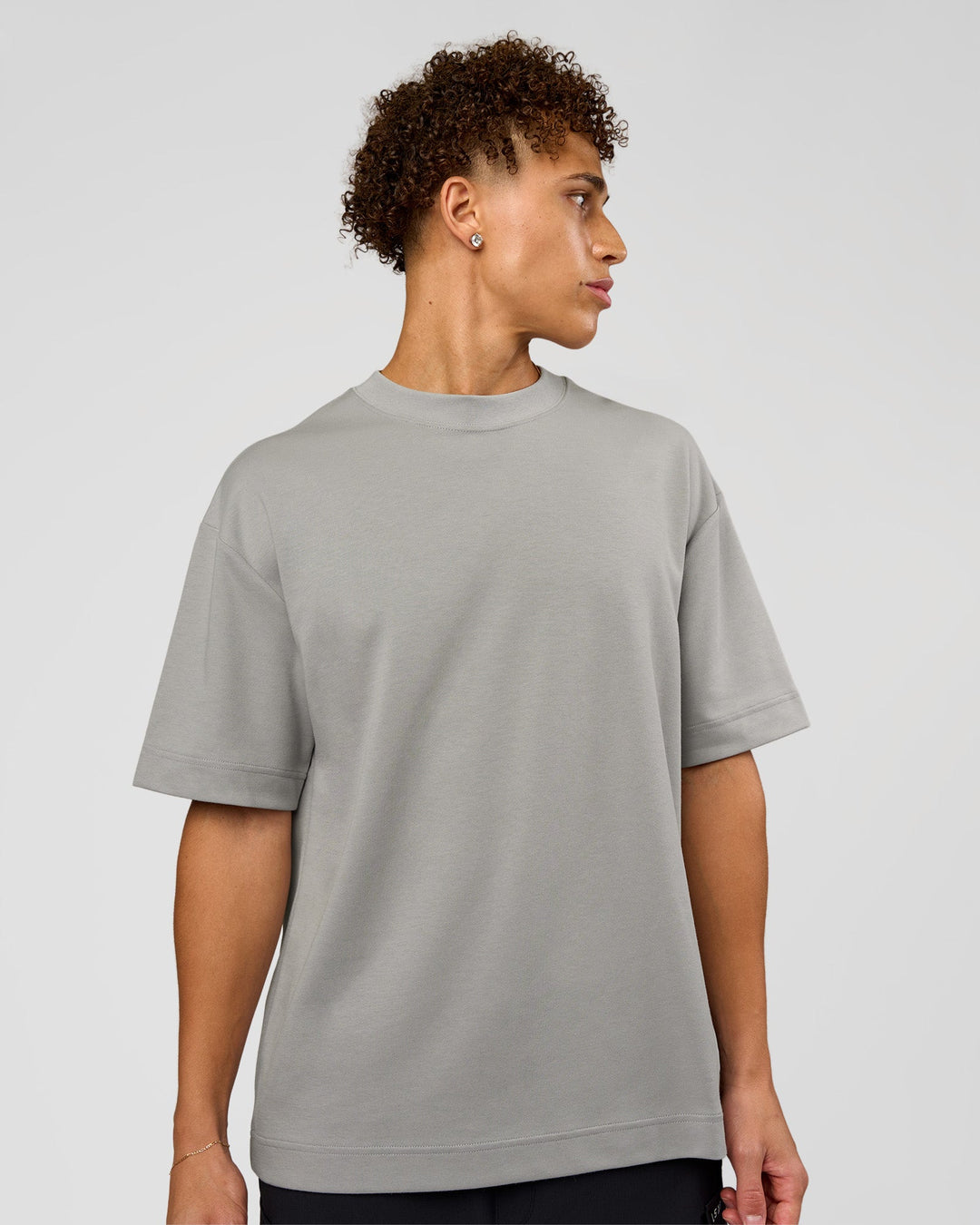 Man wearing AfterDark ZeroCrease Oversized Tee - Alloy | Model:Leandro | Size:M - view 2