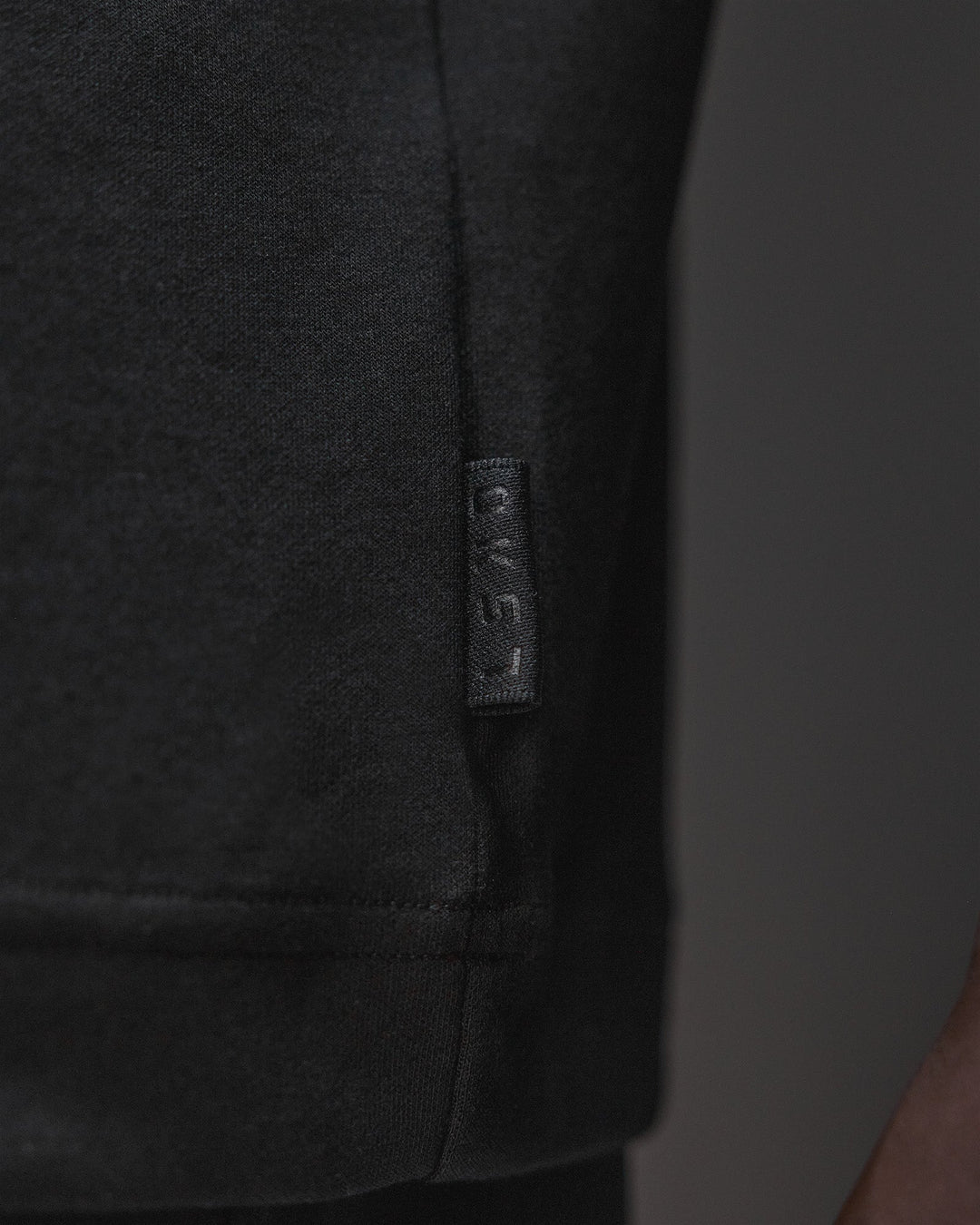 Man wearing AfterDark ZeroCrease Oversized Tee - Black | Model:Mabyro | Size:M