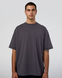 Man wearing AfterDark ZeroCrease Oversized Tee - Dark Storm | Model:Zoran | Size:M