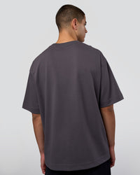 Man wearing AfterDark ZeroCrease Oversized Tee - Dark Storm | Model:Zoran | Size:M