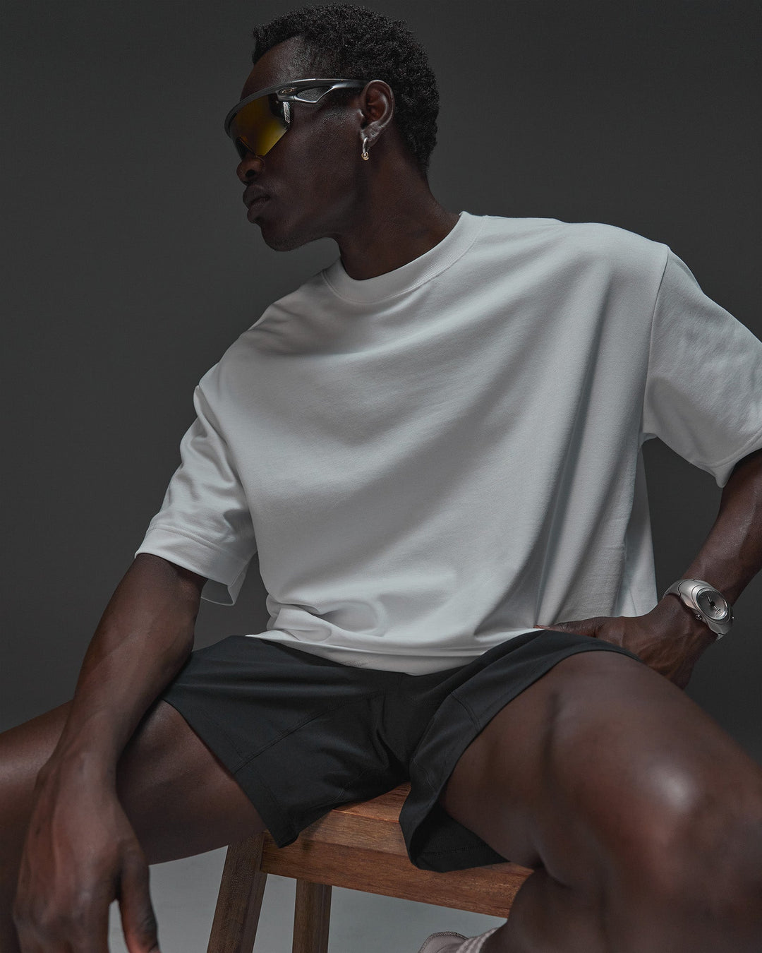 Man wearing AfterDark ZeroCrease Oversized Tee - White | Model:Mabyro | Size:M