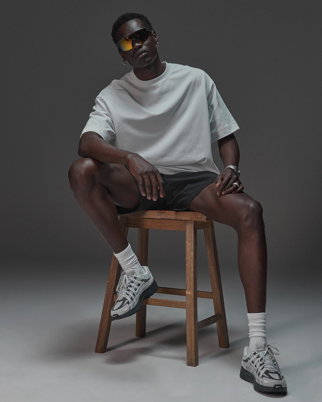 Man wearing AfterDark ZeroCrease Oversized Tee - White | Model:Mabyro | Size:M