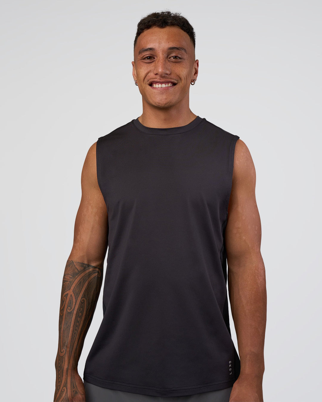 Man wearing AirTrack Muscle Tank - Black | Model:Daarian | Size:M