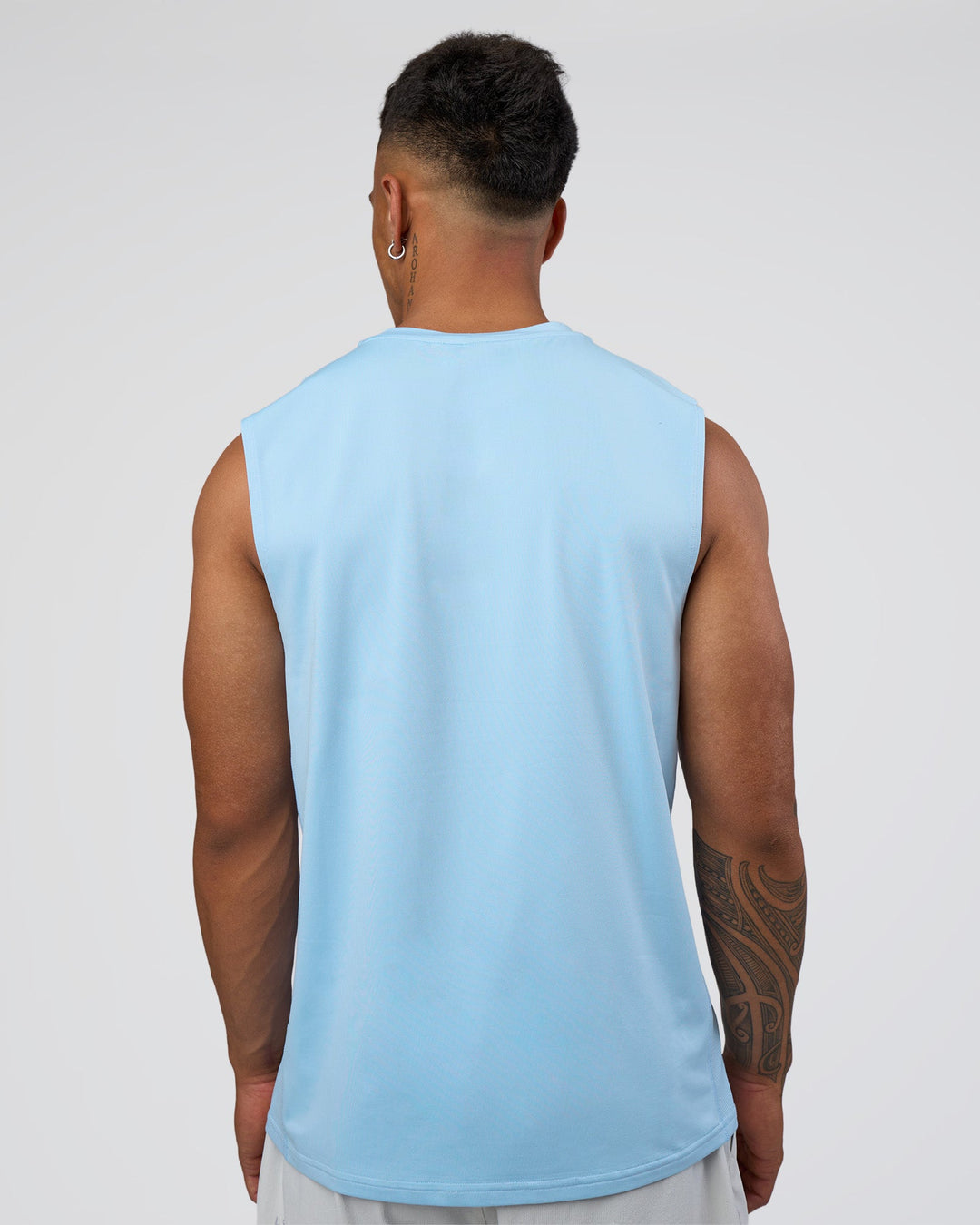 Man wearing AirTrack Muscle Tank - Open Air | Model:Daarian | Size:M