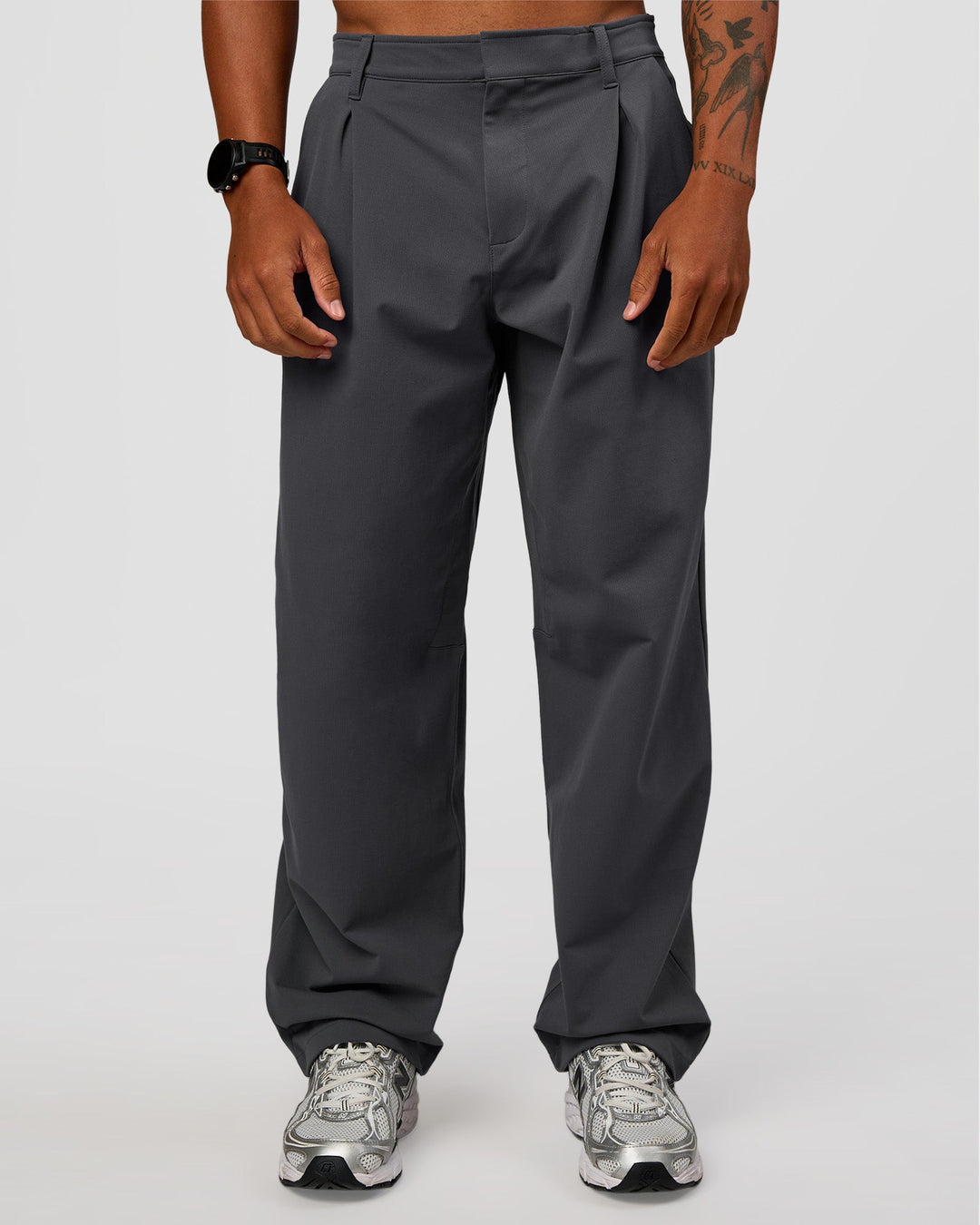 Man wearing All Day ZeroCrease™ Wide Leg Pant - Dark Storm | Model:Malebo | Size:M