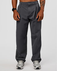 Man wearing All Day ZeroCrease™ Wide Leg Pant - Dark Storm | Model:Malebo | Size:M