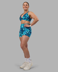 Woman wearing Aria Triangle Sports Bra - Luminous | Model:Sami | Size:M