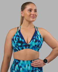 Woman wearing Aria Triangle Sports Bra - Luminous | Model:Sami | Size:M