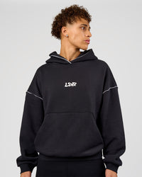 Man wearing Axis Oversized Hoodie - Caviar-White | Model:Leandro | Size:M