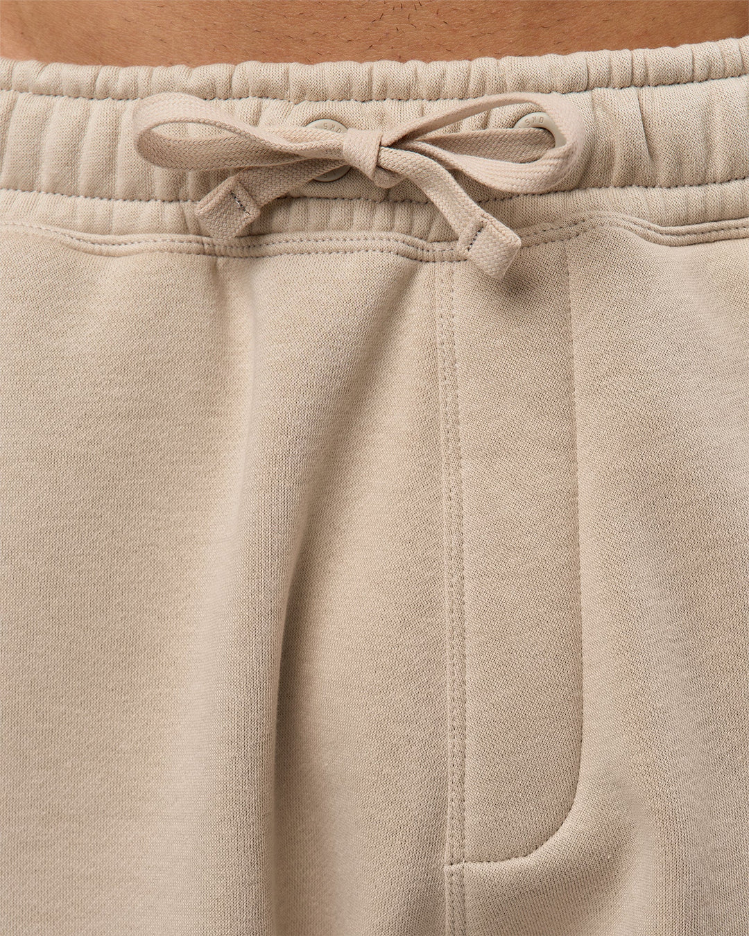 Man wearing Base Baggy Cuffed Track Pant - Shale Beige | Model:Albert | Size:M |