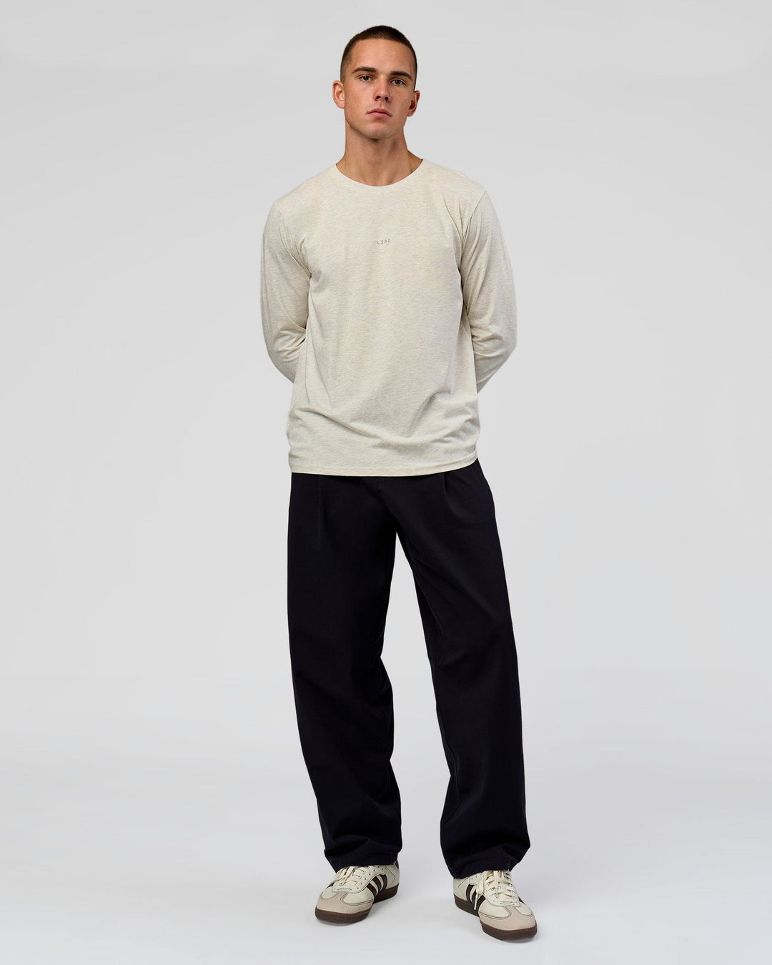 Man wearing Base FLXCotton Long Sleeve Tee in Silver Marl | Model:Albert | Size:M
