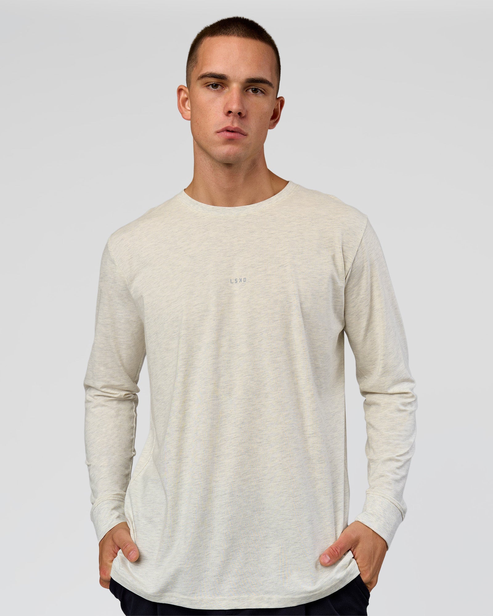 Man wearing Base FLXCotton Long Sleeve Tee in Silver Marl | Model:Albert | Size:M