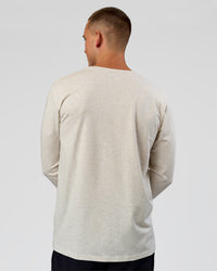 Man wearing Base FLXCotton Long Sleeve Tee in Silver Marl | Model:Albert | Size:M