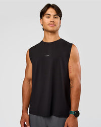 Man wearing Base FLXCotton Tank Regular Fit -8cm - Black | Model:George | Size:M