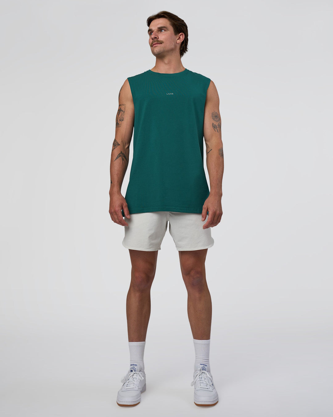 Man wearing Base FLXCotton Tank - Transformative Teal | Model:Konnor | Size:M