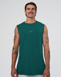 Man wearing Base FLXCotton Tank - Transformative Teal | Model:Konnor | Size:M