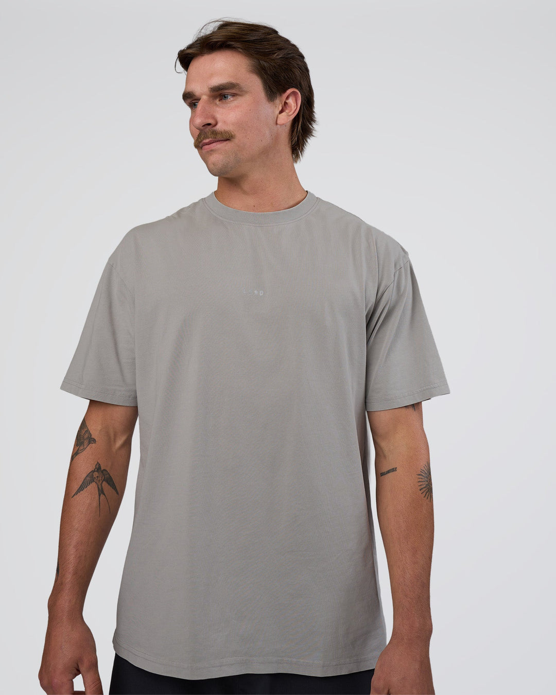 Man wearing Base FLXCotton Tee Oversized - Alloy Washed | Model:Konnor | Size:M