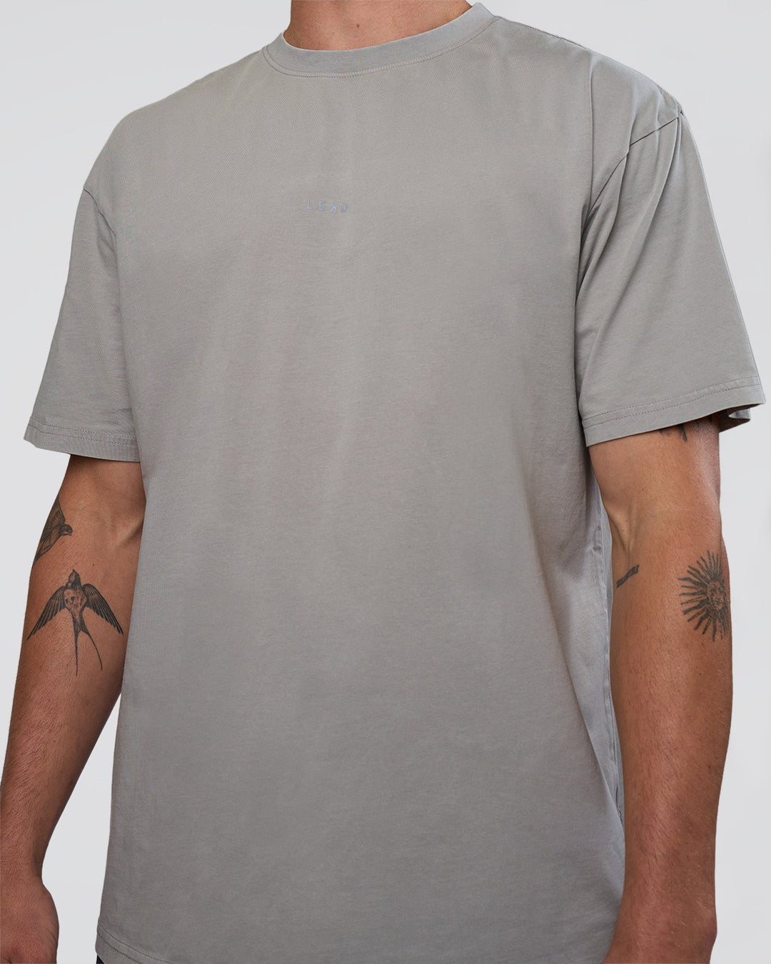 Man wearing Base FLXCotton Tee Oversized - Alloy Washed | Model:Konnor | Size:M
