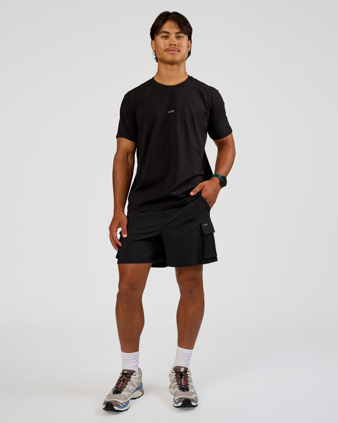 Man wearing Base FLXCotton Tee Regular Fit -8cm - Black | Model:George | Size:M