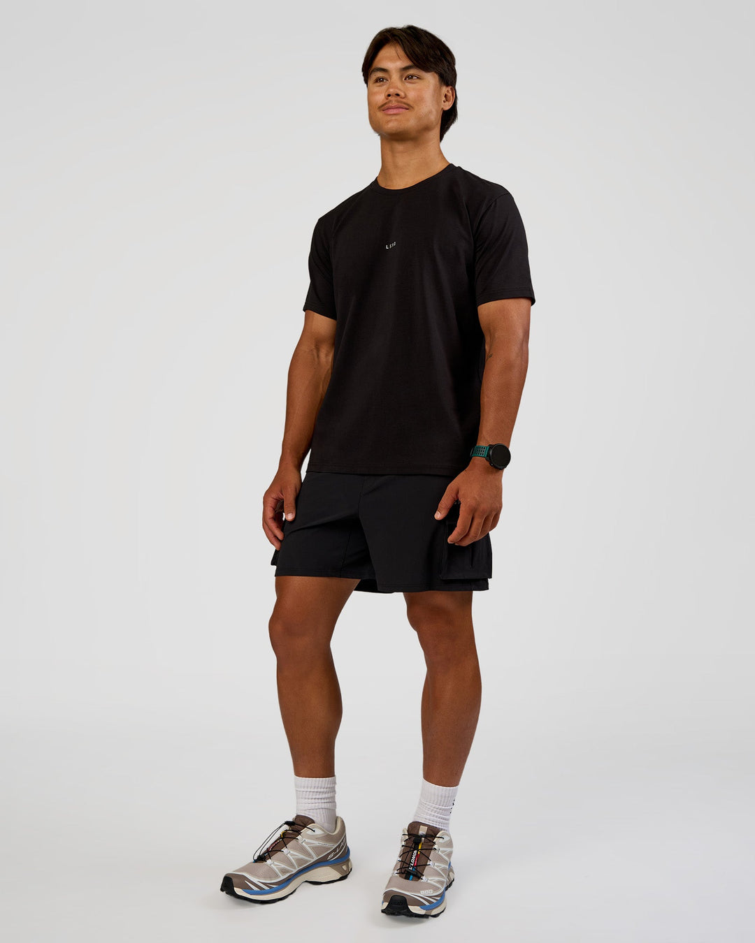 Man wearing Base FLXCotton Tee Regular Fit -8cm - Black | Model:George | Size:M