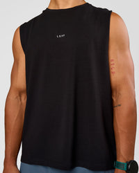 Man wearing Base Heavyweight FLXCotton Tank Regular Fit -8cm - Black | Model:George | Size:M