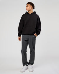 Man wearing Base Oversized Hoodie - Black | Model:Leandro | Size:M |