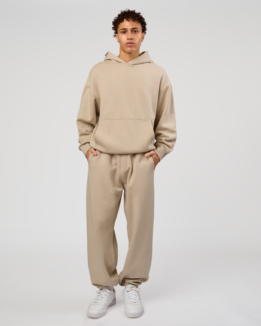 Man wearing Base Oversized Hoodie - Shale Beige | Model:Leandro | Size:M |