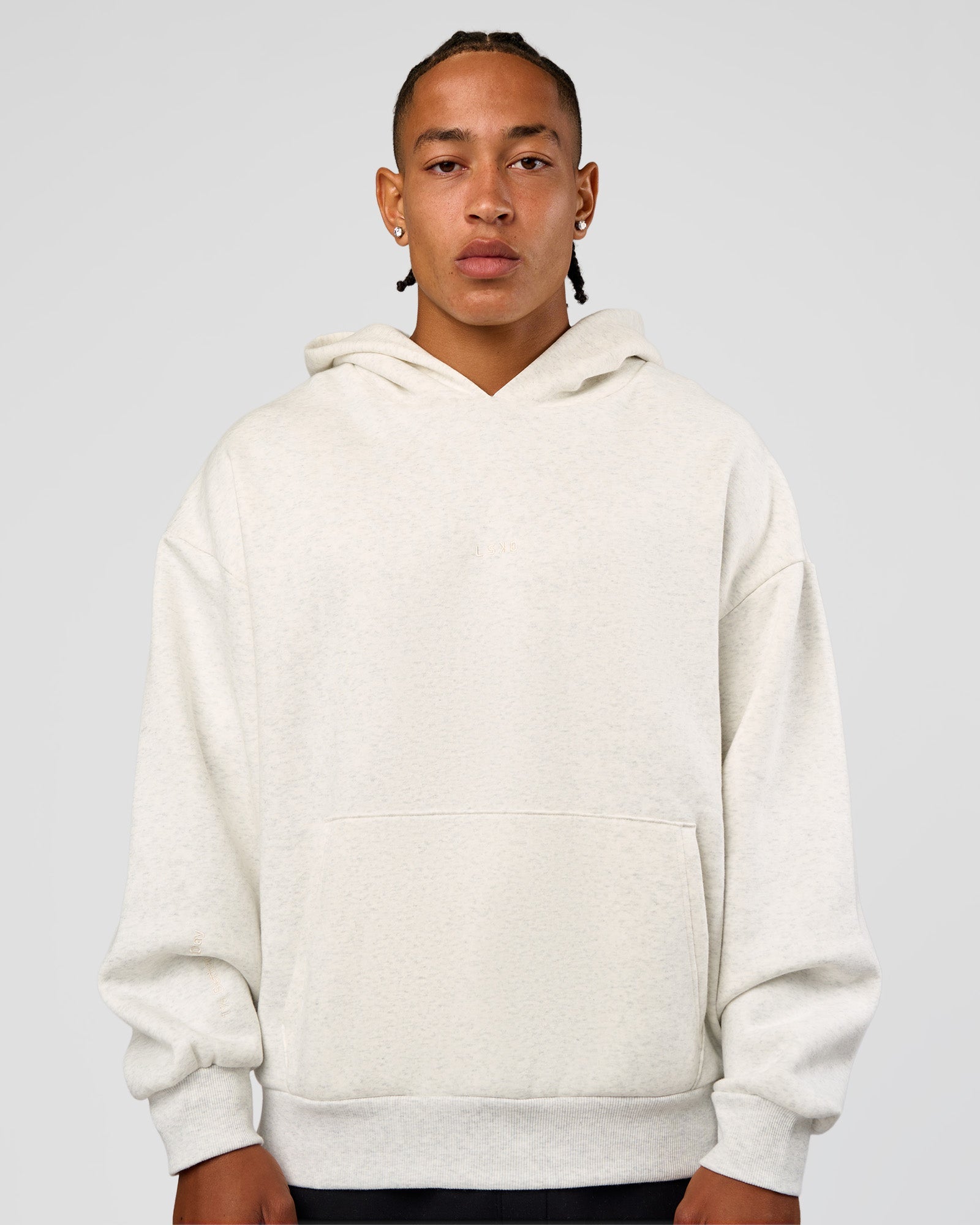 Man wearing Base Oversized Hoodie - Silver Marl | Model:Malebo | Size:M